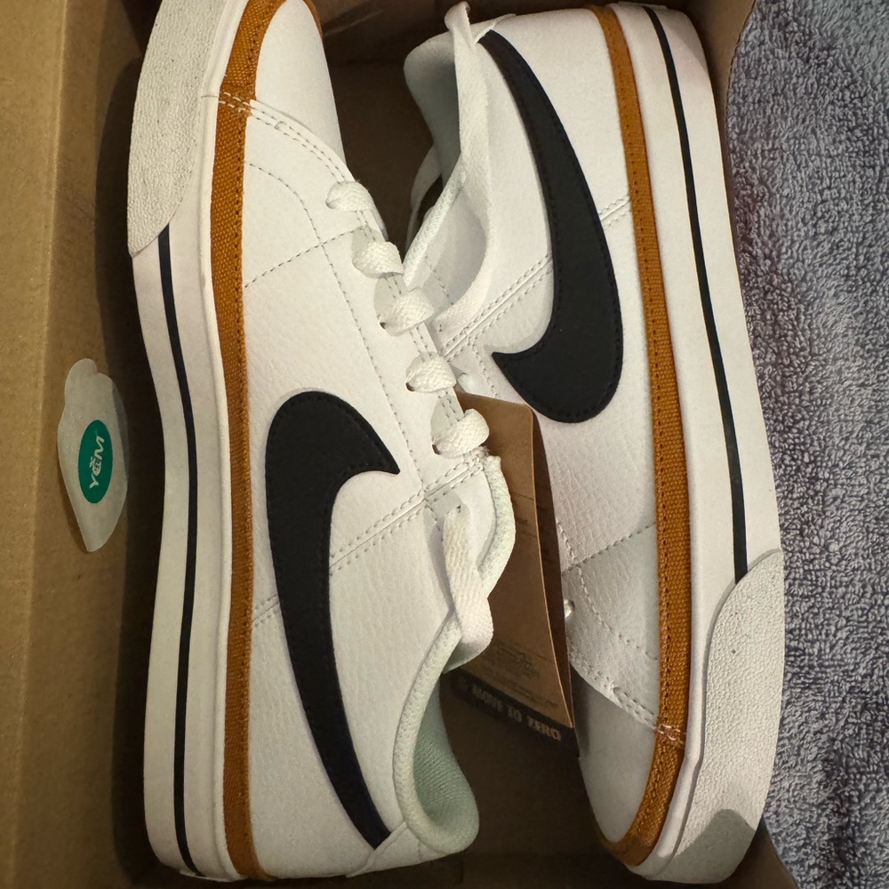 Nike Women's Court Legacy NN Sneakers in Black/White and Desert Ochre.